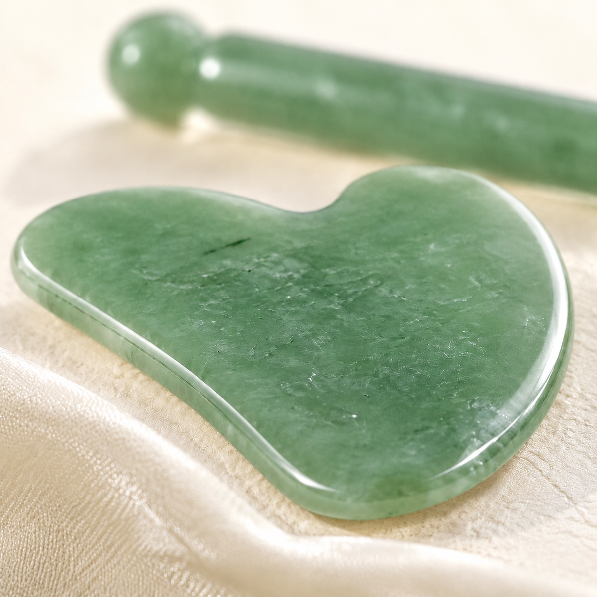 Premium natural jade facial Gua Sha tool bringing radiance look, face lifting, removing fine lines, suitable for facial or body massage. Relieves tension and enables acupressure massage; ideal for body care, gift for mom and travel.